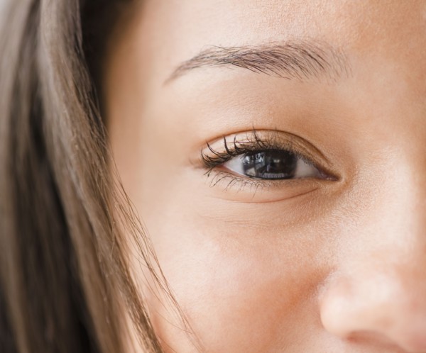 Close up of mixed race teenage girl's eye