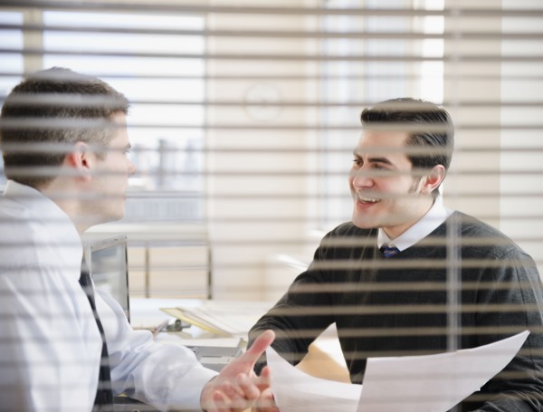 Businessmen working together in office