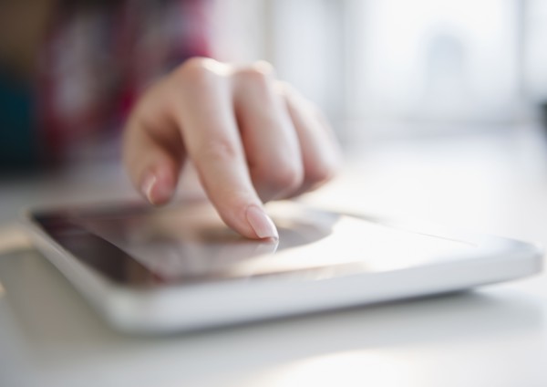 Korean woman using digital tablet