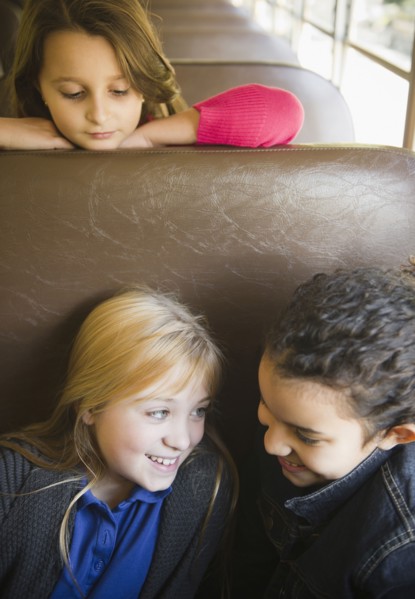 Children riding on school bus