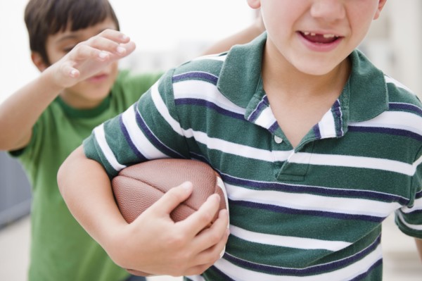 Boys playing football