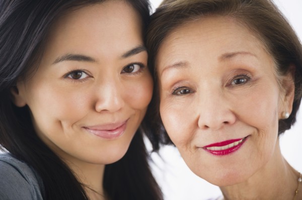 Smiling Japanese mother and daughter