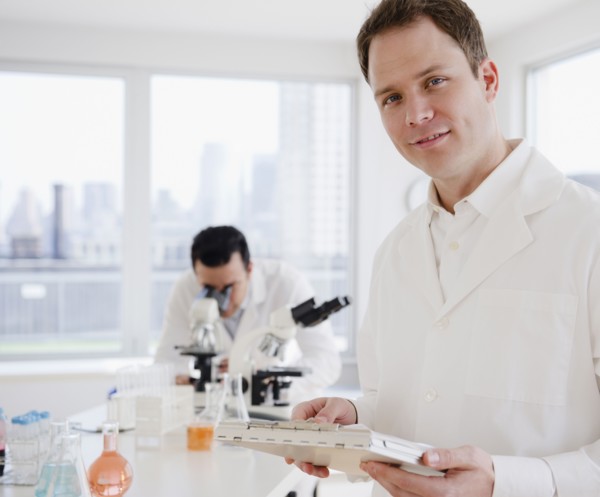 Scientists working in laboratory
