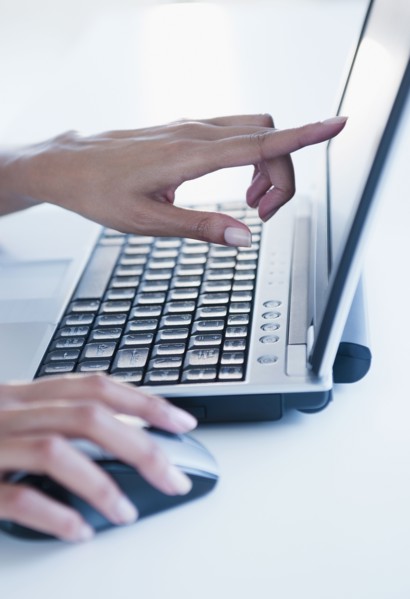 Cape Verdean woman using laptop