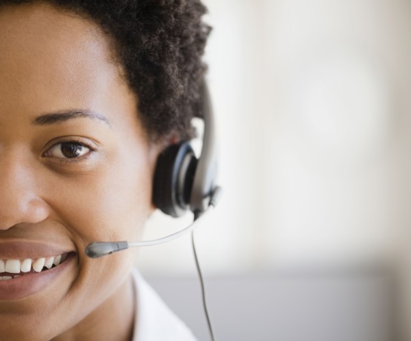African American woman talking into headset