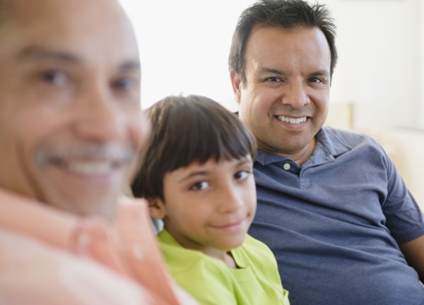 Smiling Hispanic grandfather