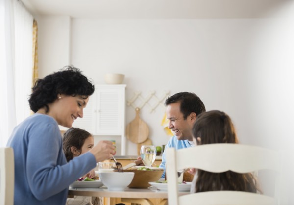 Family eating together at table