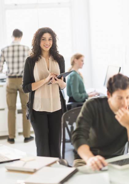 Businesswoman using digital tablet in office