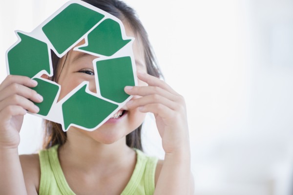 Korean girl holding recycle symbol