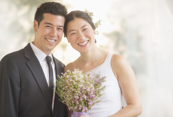 Newlywed couple smiling