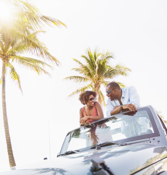 Couple relaxing together in car
