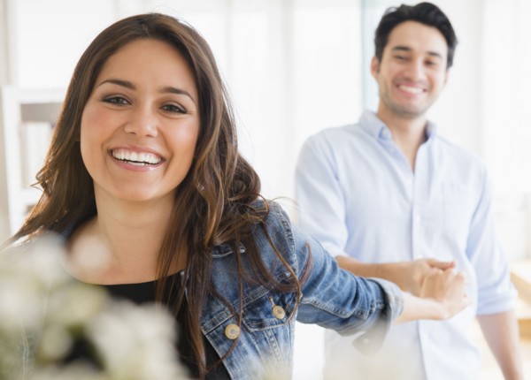 Woman pulling hand of boyfriend