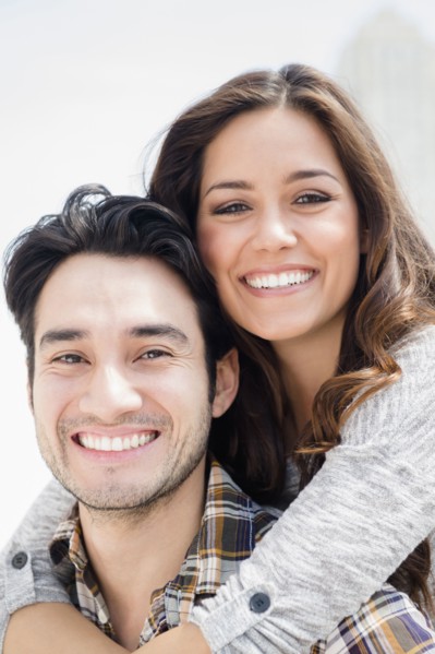 Smiling couple hugging