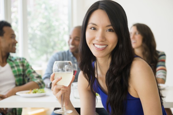 Woman smiling at restaurant