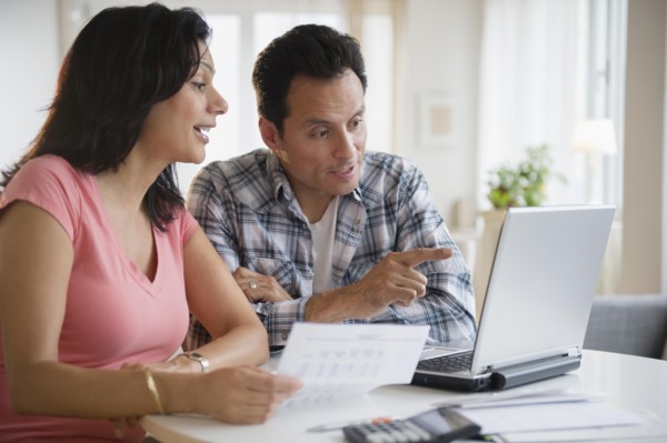 Couple paying bills online
