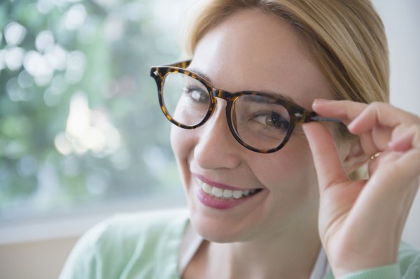 Smiling Caucasian woman wearing eyeglasses