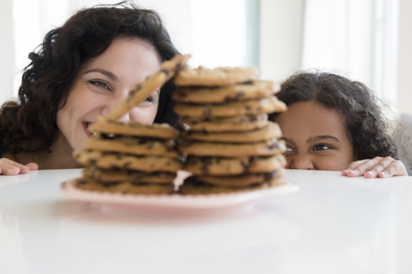 Mother and daughter admiring cookies