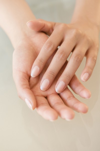 Close up of hands of Hispanic woman