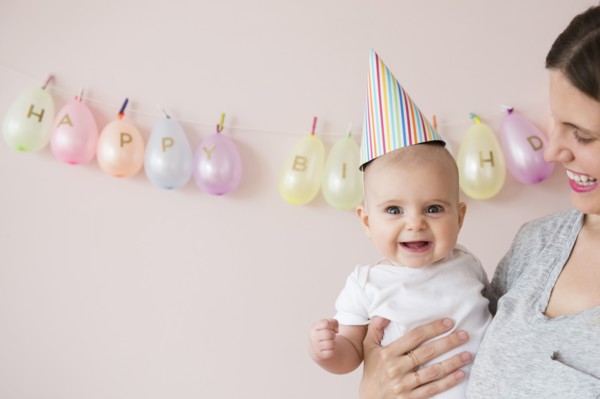 Caucasian mother and daughter celebrating birthday
