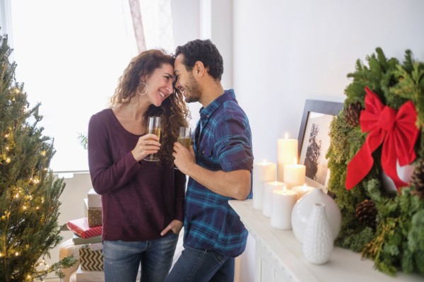Couple drinking champagne at Christmas