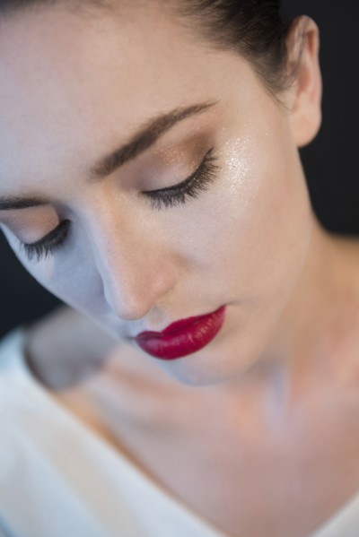 Caucasian woman wearing glamorous makeup