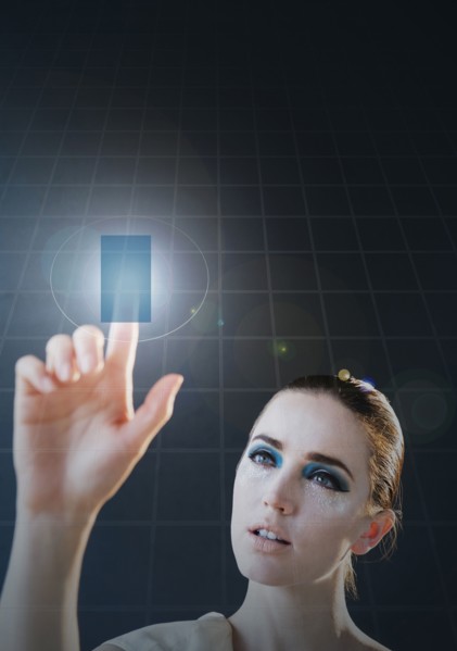 Caucasian woman using holographic touch screen