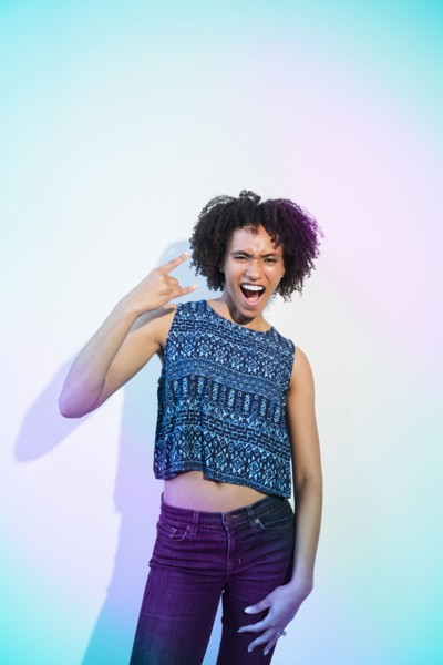 Black woman gesturing with fingers