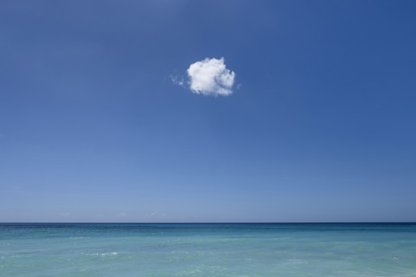 Cloud in blue sky over ocean