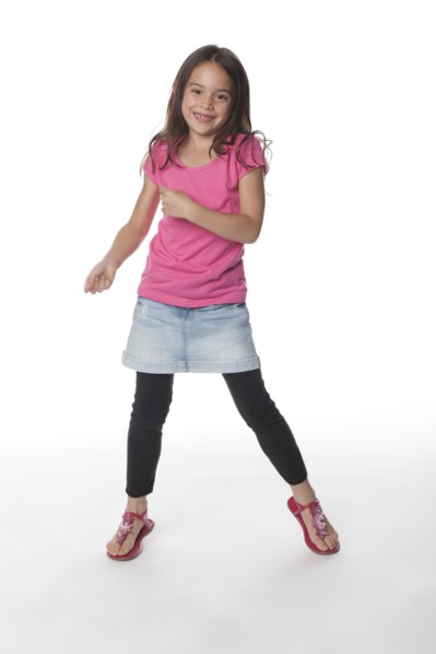 Smiling girl dancing