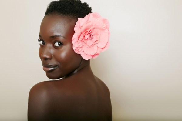 African American woman wearing flower in hair