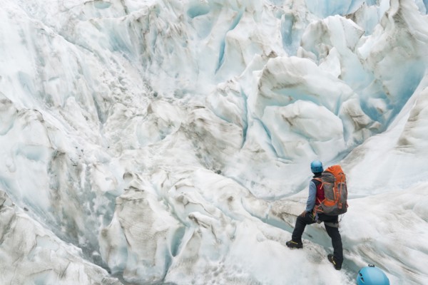 People hiking on glacier