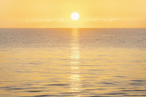 Calm sea at sunrise