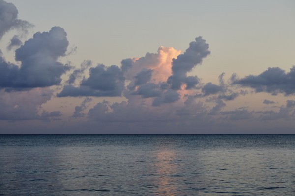 Clouds over ocean at sunrise