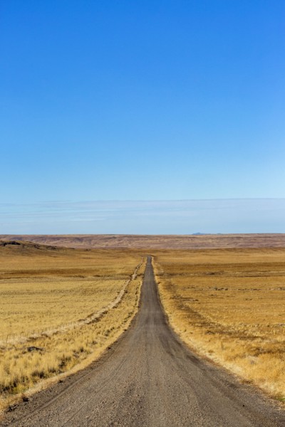 Empty desert road and blue sky