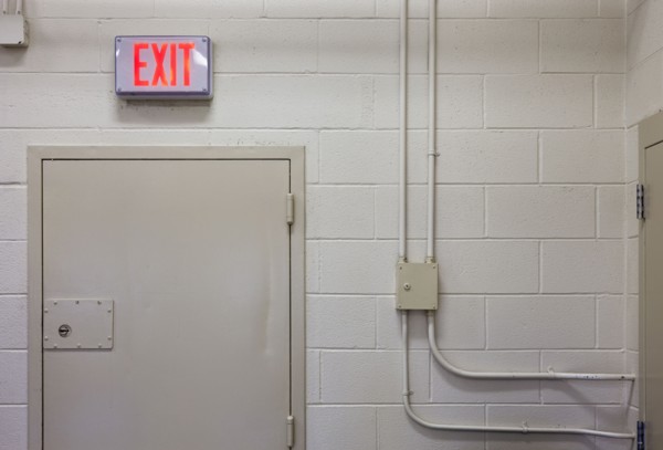 Exit sign in industrial interior