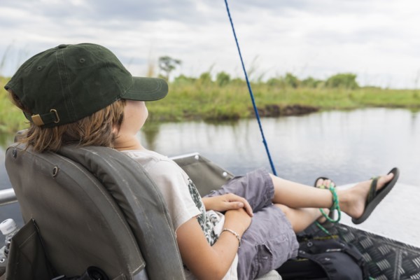 Boy in boat on Zambezi River