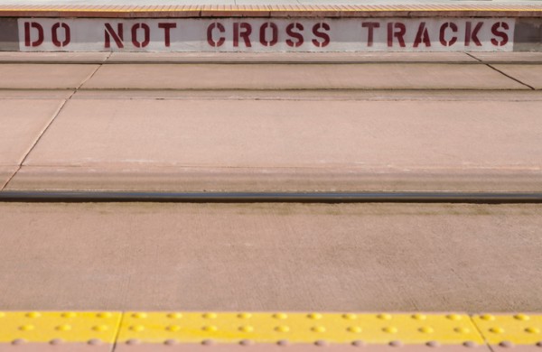 Warning text on platform