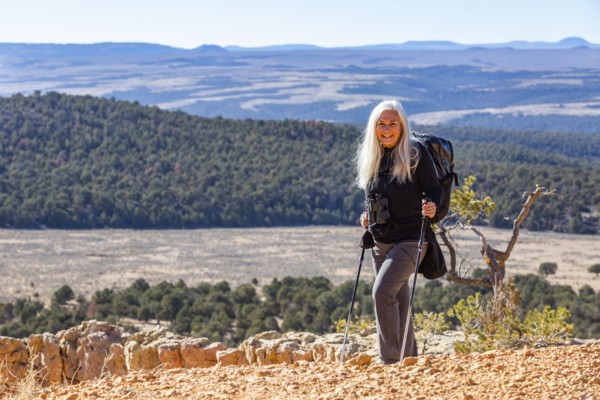 Portrait of senior hiker in rocky landscape
