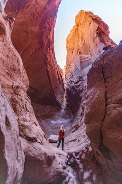 Senior female hiker standing in canyon