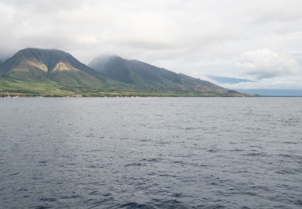 Scenic view of hills and water