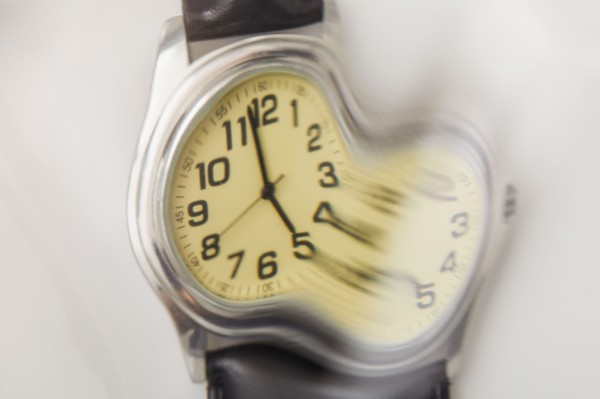 Close-up of distorted wristwatch