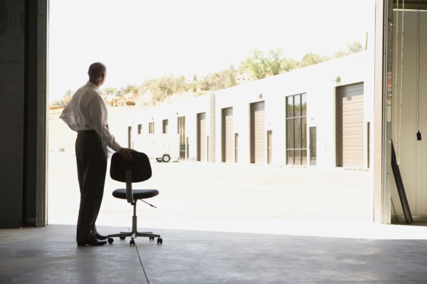 Businessman in warehouse