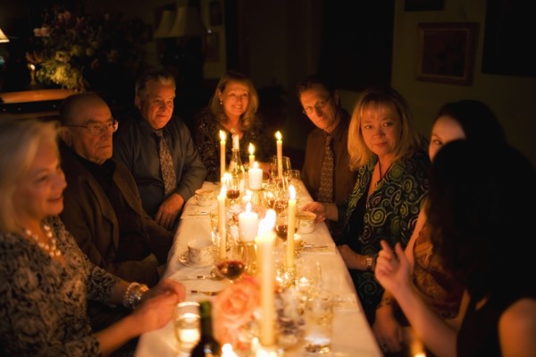 Group of friends celebrating in restaurant