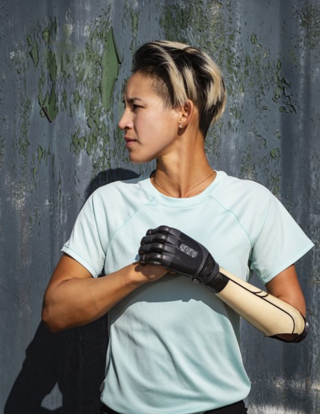 Portrait of athletic woman with prosthetic arm
