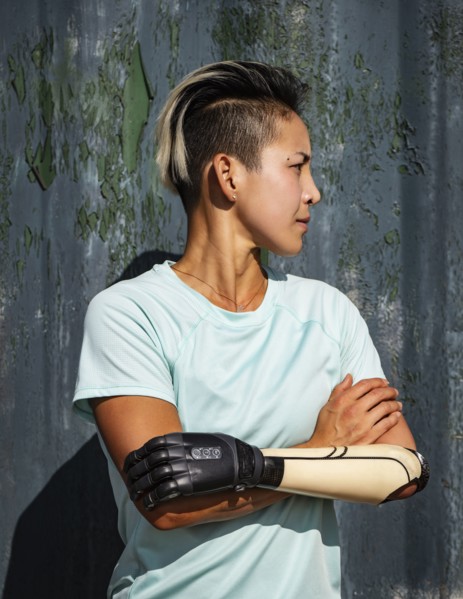 Portrait of athlete woman with prosthetic arm