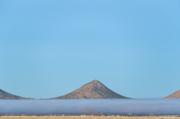 Fog above desert landscape in Cerrillos Hills State Park