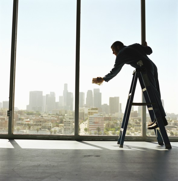 USA, California, Los Angeles, Window washer cleaning windows