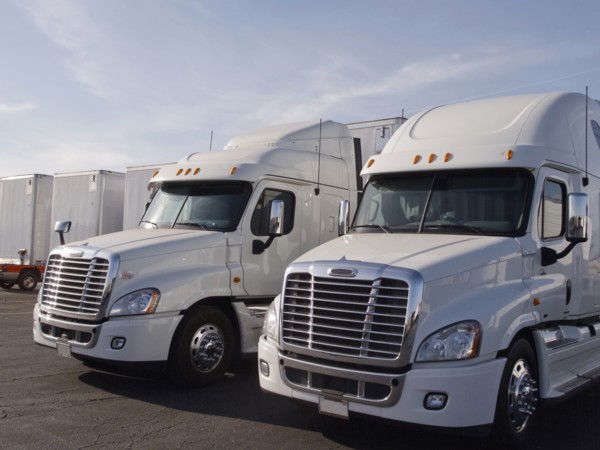 Semi trucks in parking lot