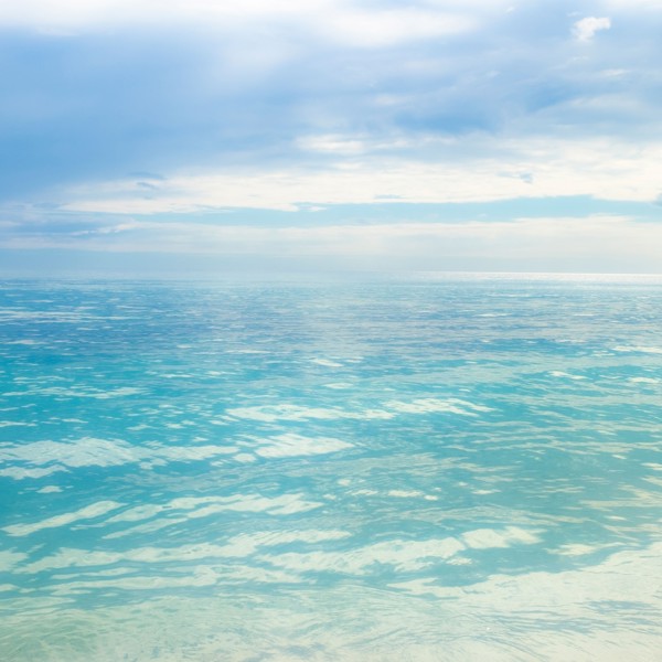 Blue sky over calm sea