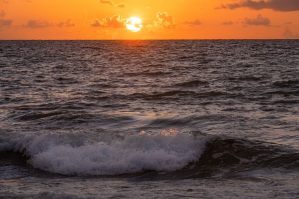 Ocean waves at sunrise
